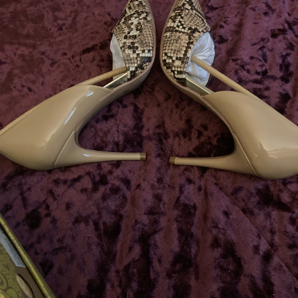 Nude and snakeskin patent pumps